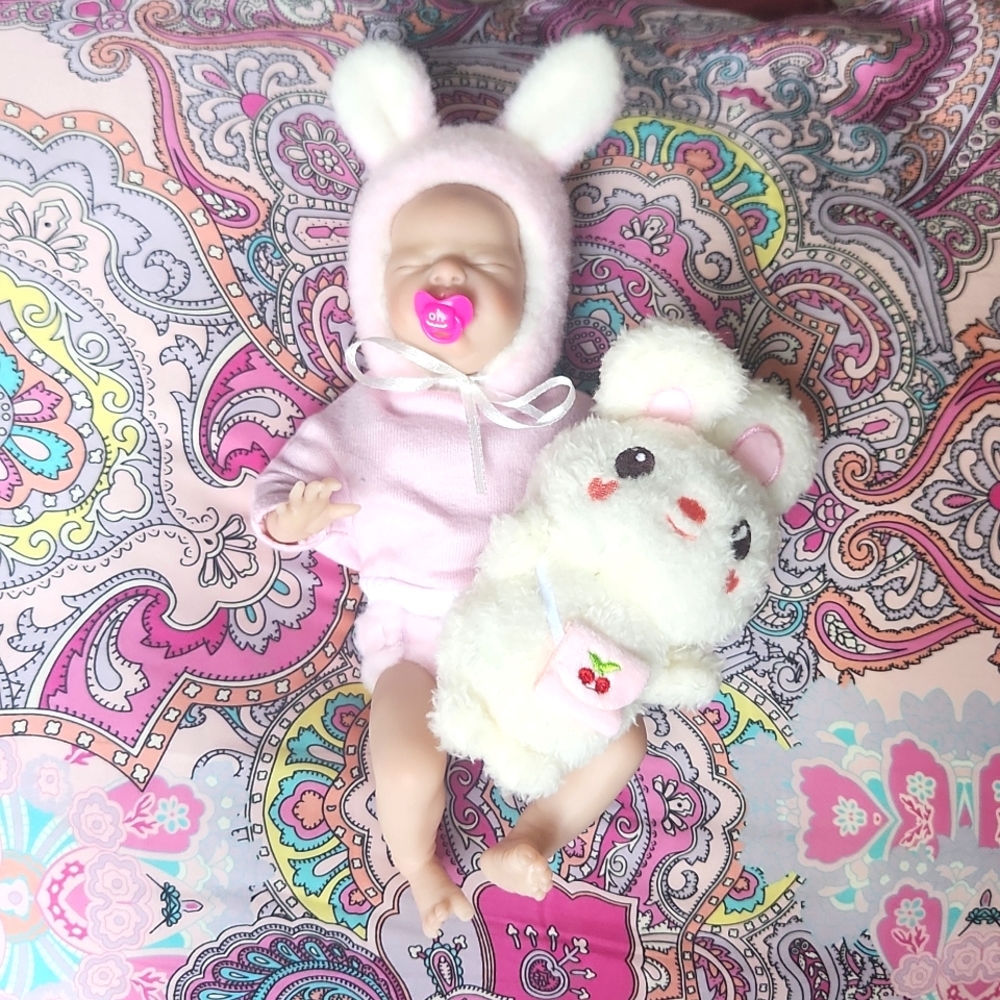 Realistic reborn baby doll dressed in fluffy bunny 🐰 outfit